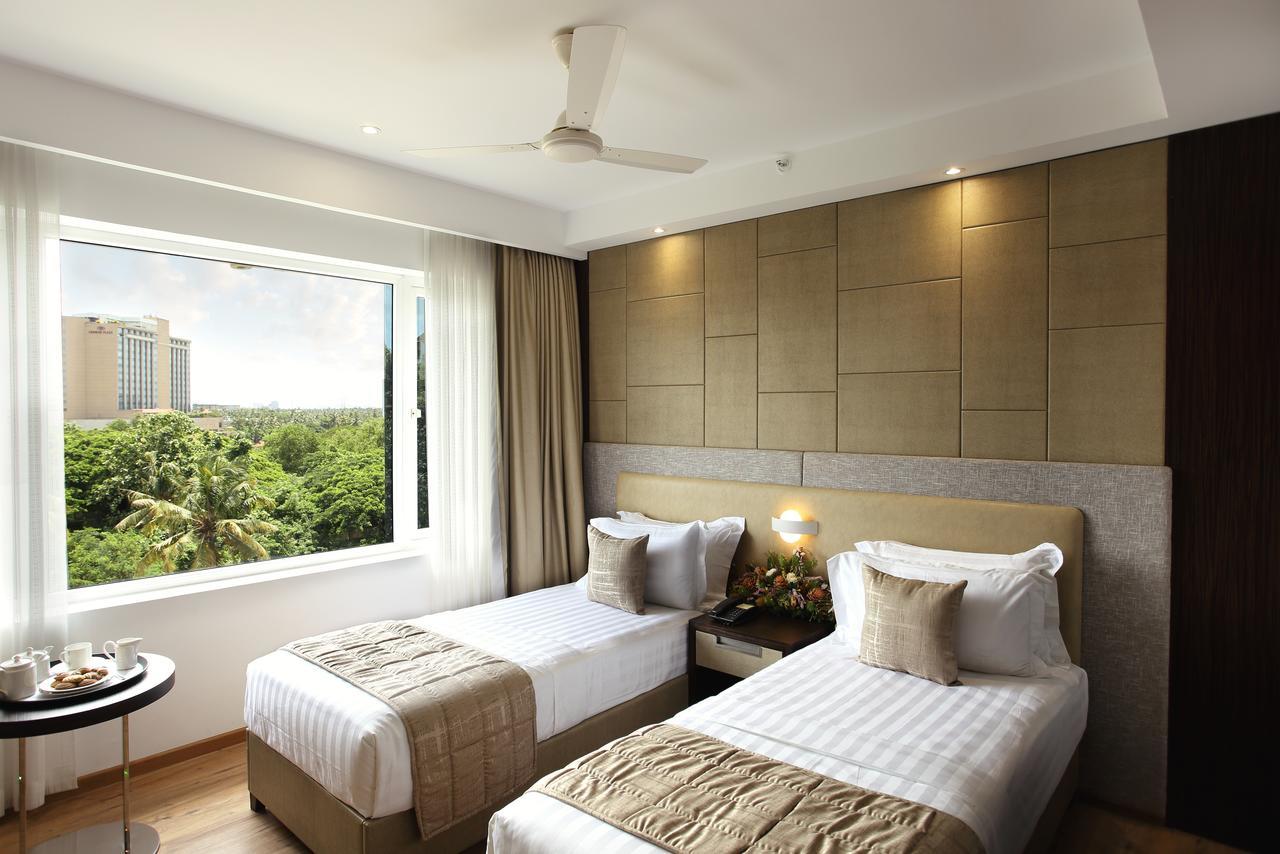 Sugar Business Hotel Kochi Exteriör bild
